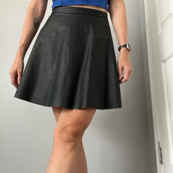 Vince Camuto | size 2 | skater skirt | faux leather | raw hem - Picture 1 of 7